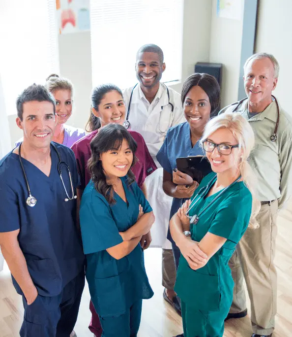 Group photo of male and female doctors standing together